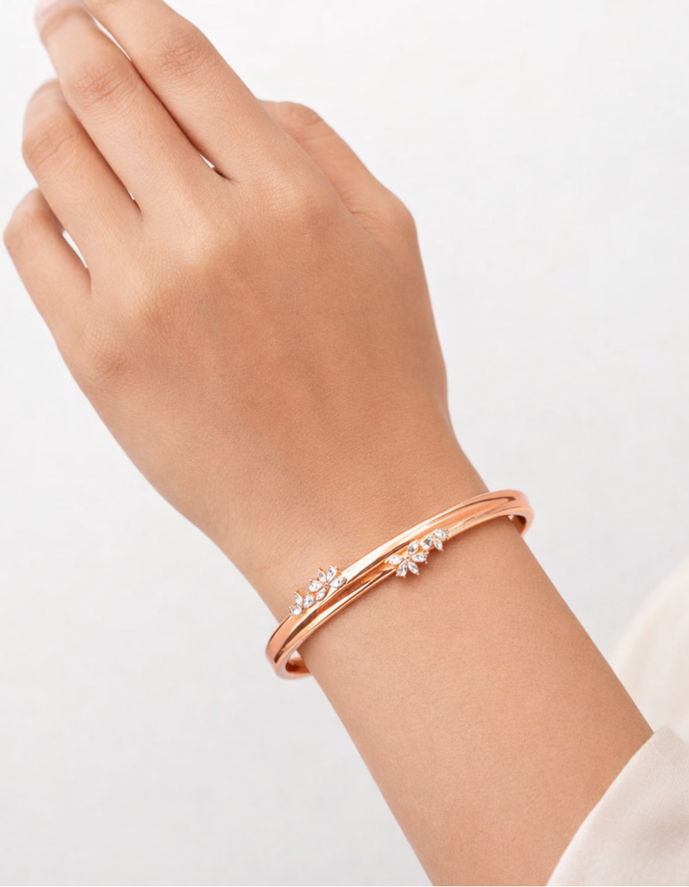 Rose gold plated open floral kada bracelet with cubic zirconia stones adjustable cuff for women by SARYA