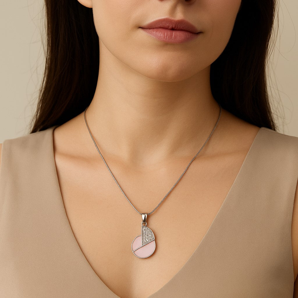 Half-pink enamel, half-studded crystal design on a Sleek chain