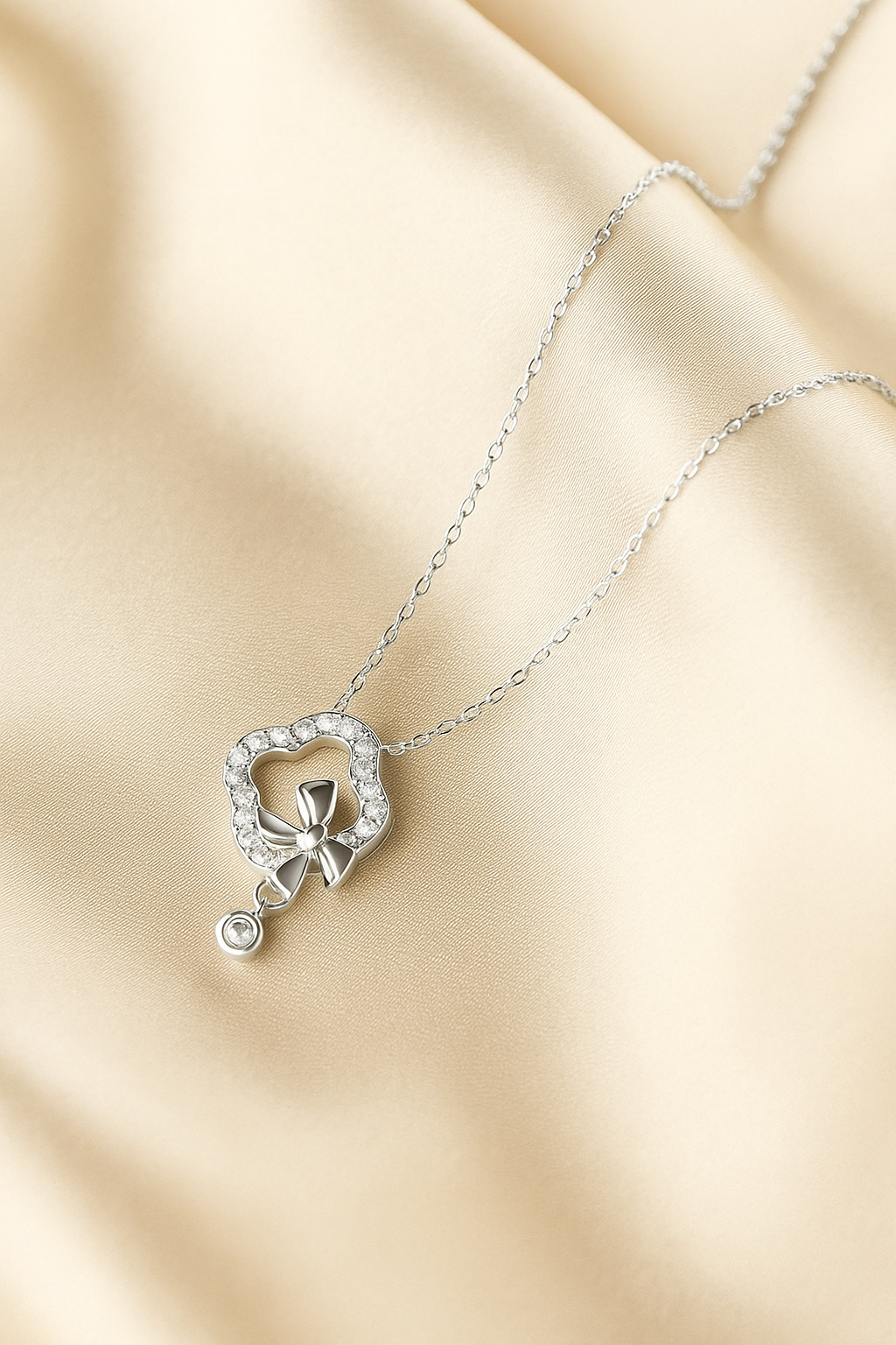 Silver Bow Halo Pendant Necklace — 925 Sterling Silver